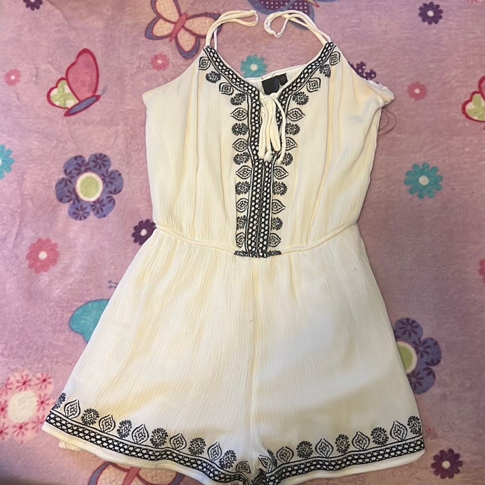A white and black romper